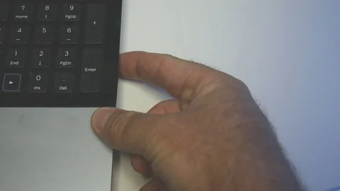 Slow Motion Man Insert in Laptop CD with Anti Virus Malware Infection Software Vídeo Stock 80747110