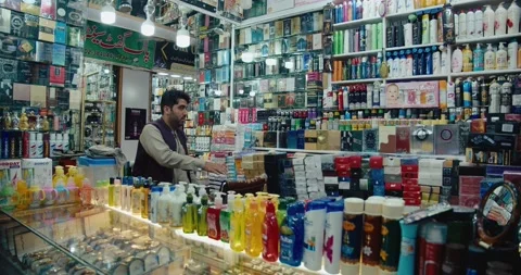 Slow motion of a man in a local cosmetics shop in Quetta, Pakistan Stock Footage 229490465