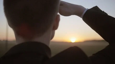 Slow motion of man looking forward at the sun Stock Footage 71929379