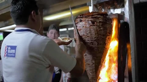 Slow Motion Man Making Al Pastor Tacos At A Restaurant In Mexico City Stock Footage 154643860
