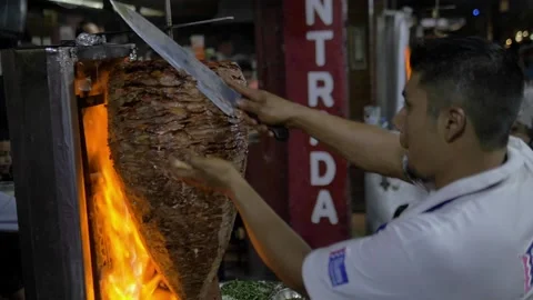 Slow Motion Man Making Al Pastor Tacos At A Restaurant In Mexico City Stock Footage 154644039