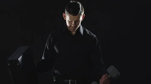 Slow motion man picking up weight and suitcase Stock Footage 80133237