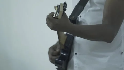 Slow Motion Of Man Playing An Electric Guitar Stock Footage 300724368