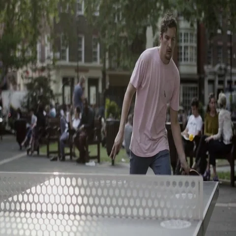 Slow motion of man playing a table tennis outdoors Stock Footage 69464600