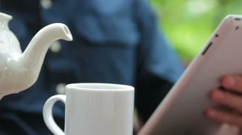 Slow Motion of man pouring tea Stock Footage 40667534
