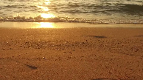 SLOW MOTION: man running in shallow sea at sunset 1920x1080 Stock Footage 58283008