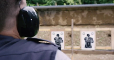 Slow Motion Of Man Starting To Shoot A Gun Stock Footage 145480296