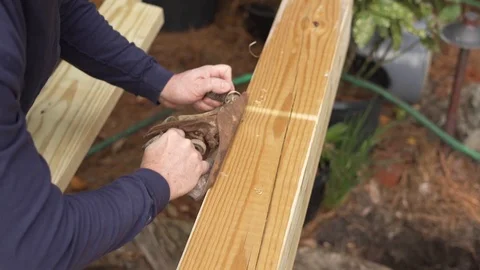 Slow motion of Man using an old wood planer Video stock 124982804
