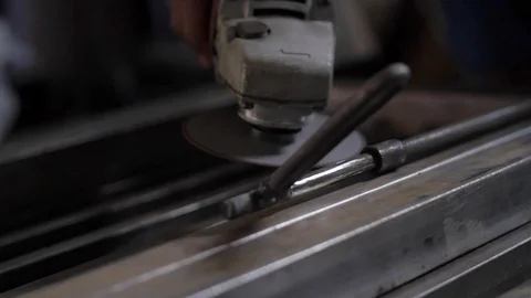 Slow motion of a man using a sander with sparkels Stock Footage 75887656