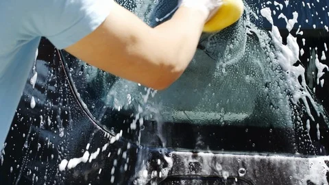 Slow motion of man washing his car Vídeo Stock 89797042