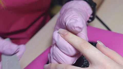 Slow motion. manicure. the master of the manicure filings the nails with a 스톡 동영상 86997753