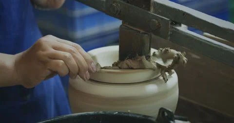 Slow motion, master potter creating ceramic products from white clay Stock Footage 203233281