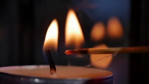 Slow motion of match igniting candle. Match Lighting Close-up Macro With Single Video stock 144033914