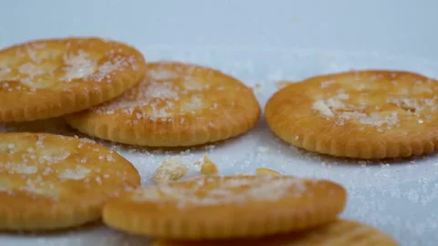 Slow Motion Medium close up crackers fall in rach-other Видео 135778305