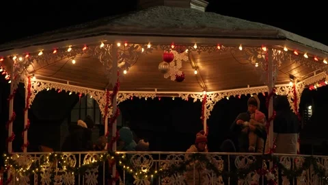 Slow motion medium shot of a dreamy gazebo with christmas lights Video stock 164327502