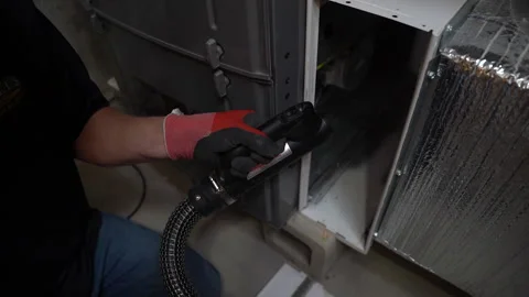 Slow motion medium shot showing professional sanitizing household air Stock Footage 195456928