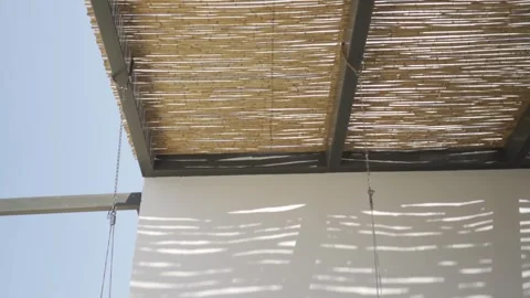 Slow motion medium shot of swing strings camera tilting to roof Stock Footage 257949997