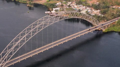 Slow motion medium shot of vehicles on Adomi Bridge Video stock 299749766