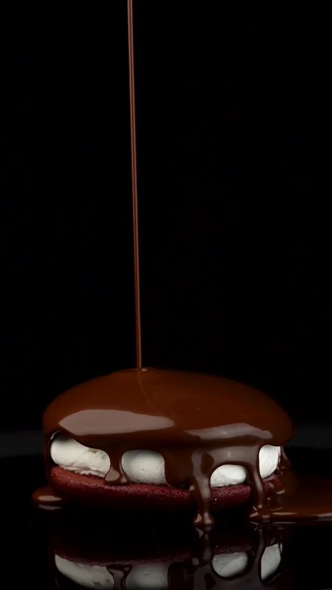 Slow Motion Melted Chocolate Pouring Over Cream Filled Dessert Stock Footage 330516754