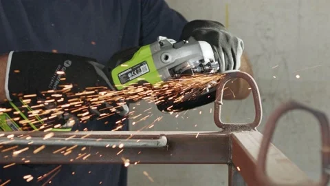 Slow motion of a metal grinder during work with sparks flying Video stock 139583089