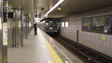 Slow motion of metro train approaching the station during late night  Stock Footage 158738997