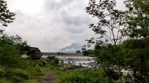 Slow motion mini waterfall with Mountain view in central java, Indonesia Stock Footage 198765306