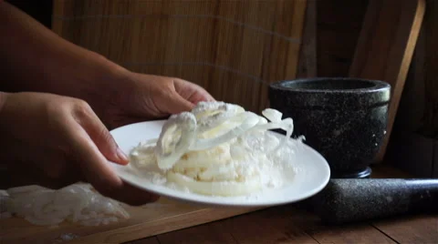 Slow motion of mixing throw flour with vegetable in dish Stock Footage 65825449