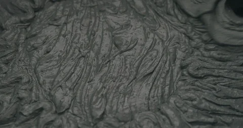 Slow motion mixing water in micro concrete plaster Stock Footage 99171227