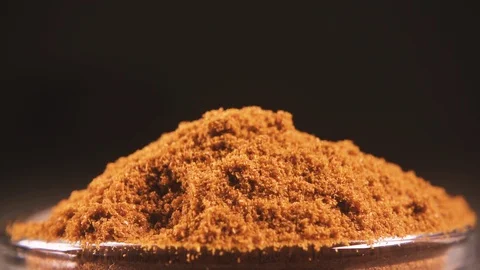 Slow motion a mixture of pepper peas falls into the red pepper close-up Video stock 95793503