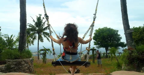 Slow Motion of Model or travel  on swing in Nusa Penida Bali Stock-Footage 242613862