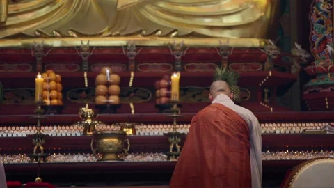 Slow motion of monk praying inside colorful Korean temple Stock Footage 313675124