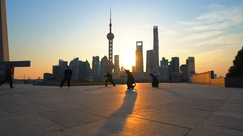 Slow motion of monks practicing Tai Chi at sunrise, Shanghai, China. Stock Footage 122469875