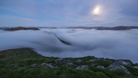 Slow motion with moon and inversion flowing over the coastline Stock Footage 122963736