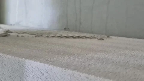 Slow Motion Mortar Application on Aerated Concrete Wall Stock-Footage 336267083