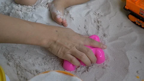 Slow motion, mother playing toy block sand shape with cute child have fun Stock Footage 95011069