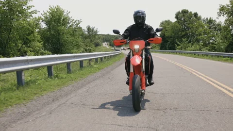 Slow motion motorcycle rounding a corner Stock Footage 161337306