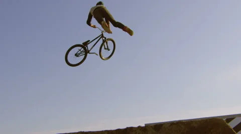 Slow Motion Mountain Bike Tailwhip on Big Jump Stock Footage