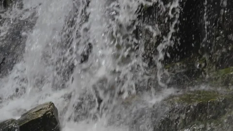 Slow Motion, Mountain Falls in the Rays of the Midday Sun Stock Footage 149788506