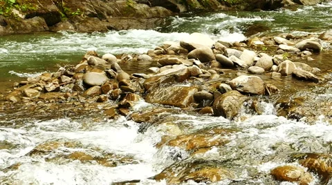 Slow motion. Mountain stream with stones Stock Footage 64590737