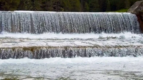 Slow motion of mountain waterfall Stock Footage 76003936