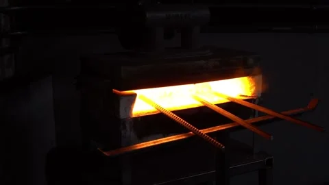 Slow Motion Movement around Hot Metal in a Furnace Stock Footage 255408879