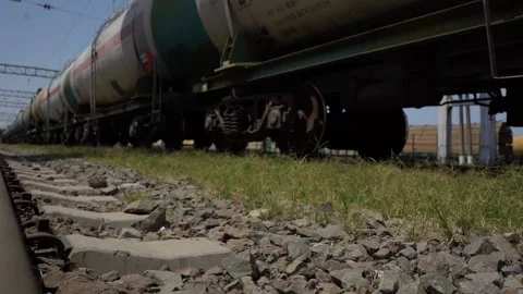 Slow Motion movement of a Train wagons loaded with Fuel Oil on Railway Tracks Stock Footage 237470220