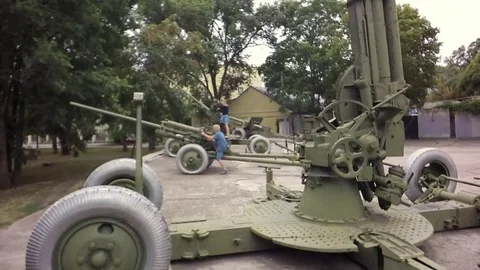 Slow motion, Moving the camera. Children play a ground-to-air missile. Video stock 79468764