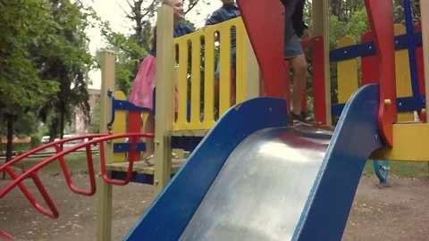 Slow motion, Moving the camera. Children play on the playground. 스톡 동영상 79570050