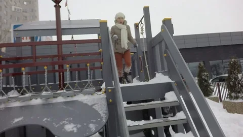 Slow motion, Moving the camera. Children are jumping into the snow. Snowing. 스톡 동영상 87544517