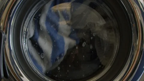 Slow motion of a moving washing machine Stock Footage 117626342
