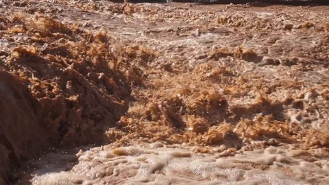 Slow motion of muddy river flooded Stock Footage 121933040