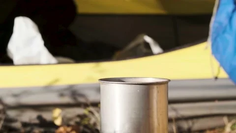 Slow motion. The mug stand against the background Stock Footage 220568646