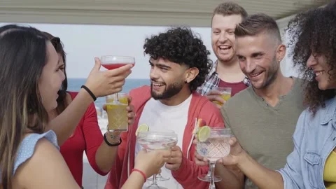 Slow motion. Multiracial Young people Friends cheers having fun together Stock Footage 179682978
