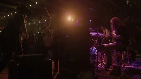 Slow motion musicians performing at live concert / music festival Stock Footage 210249224